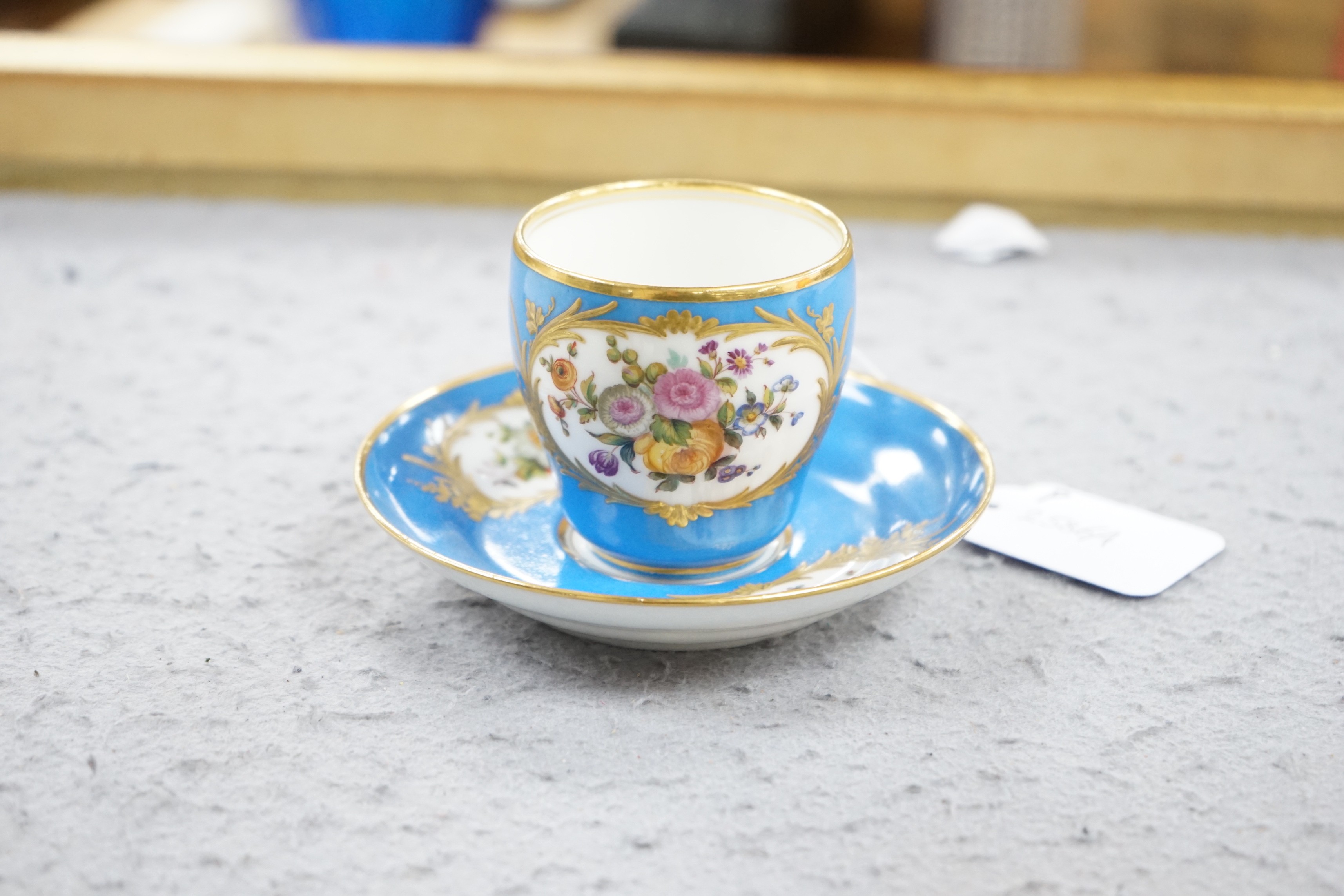A Paris porcelain Sevres style cup and saucer
